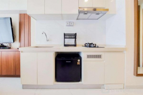 Nice Design and Minimalist Studio at Sky House BSD Apartment By Travelio